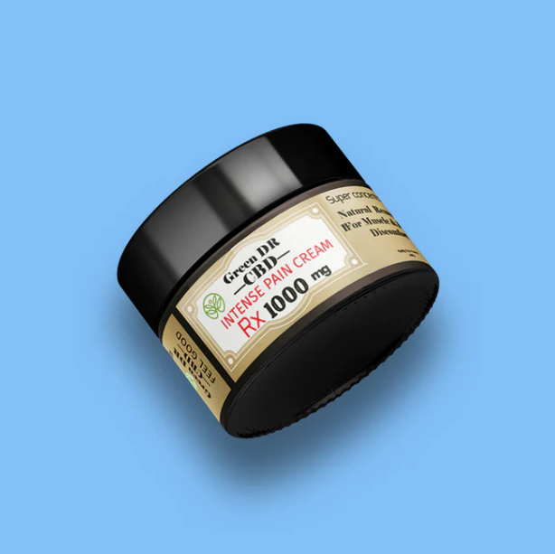 Green Dr. CBD Intense Pain Cream jar with black lid, tan label, on blue background.
