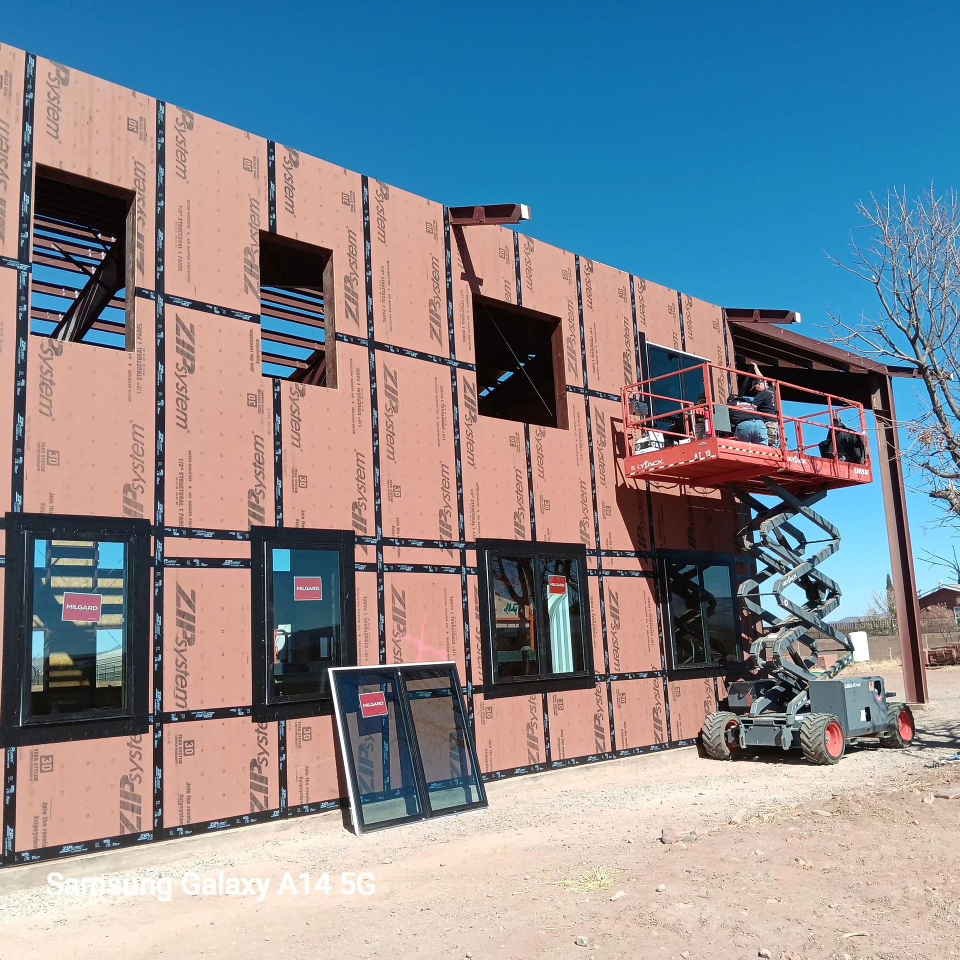 A picture of a building under construction taken on a samsung galaxy a12