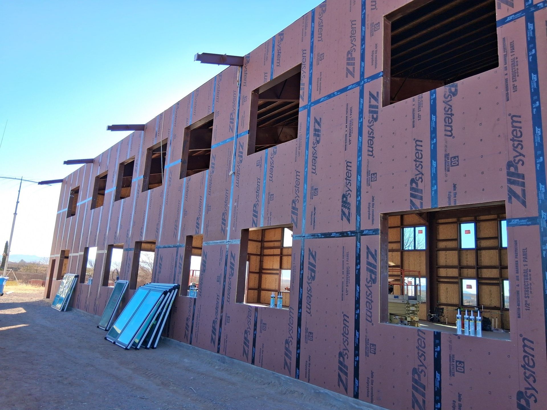 A building under construction with zipsystem written on the side