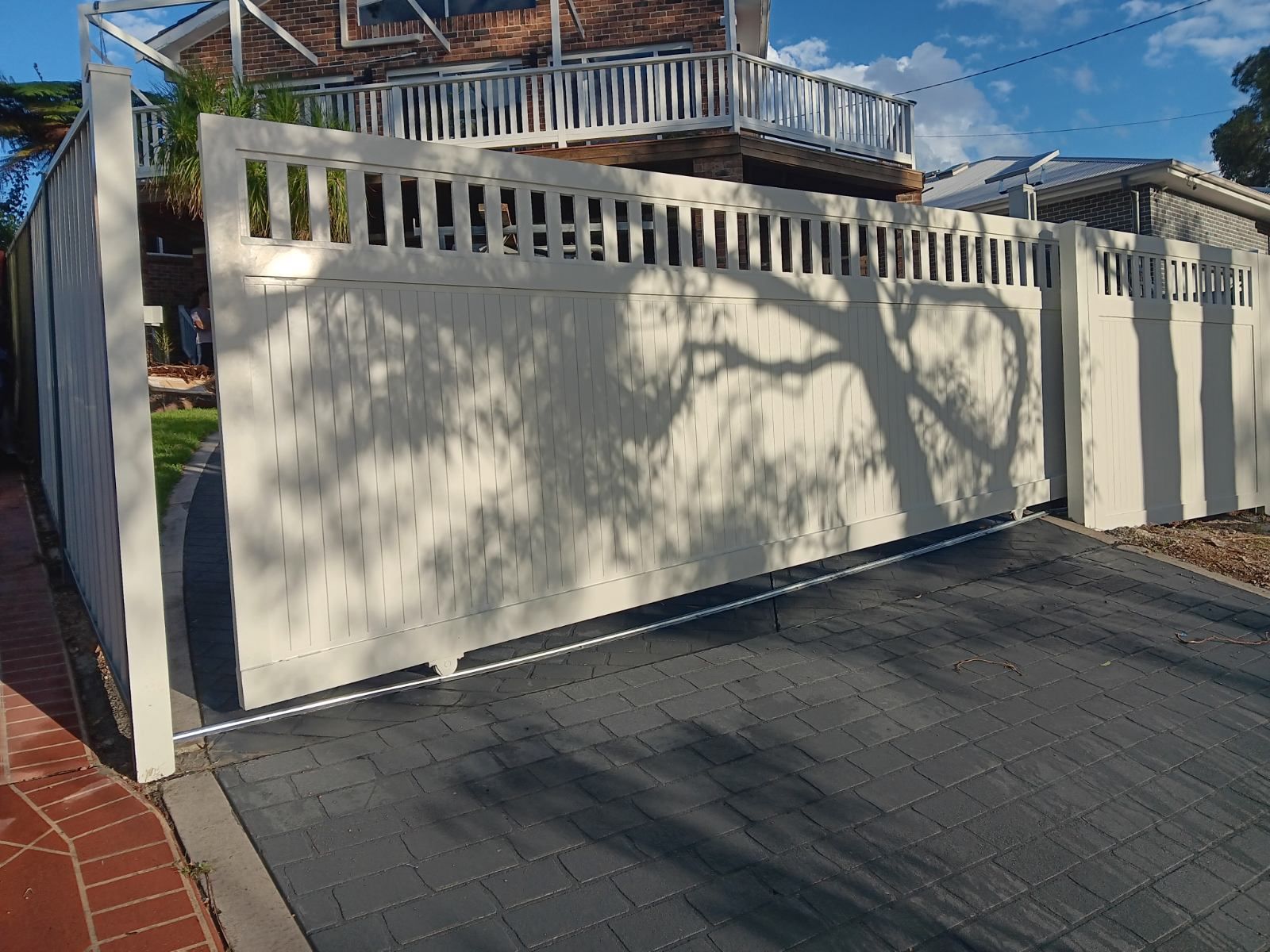 Sliding PVC Gate — Rearden Fencing Pty Ltd in Toronto, NSW