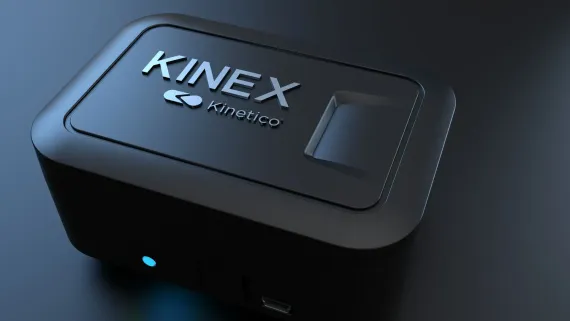 Black Kinex device with fingerprint sensor and blue light, on a dark surface.