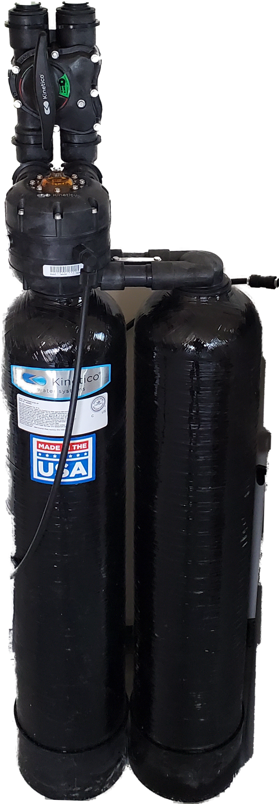 Water filtration system with two black tanks and control valve.