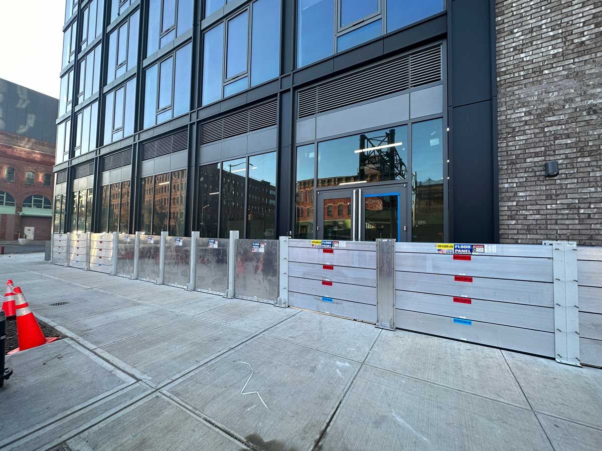 A large building with a lot of windows is being built.