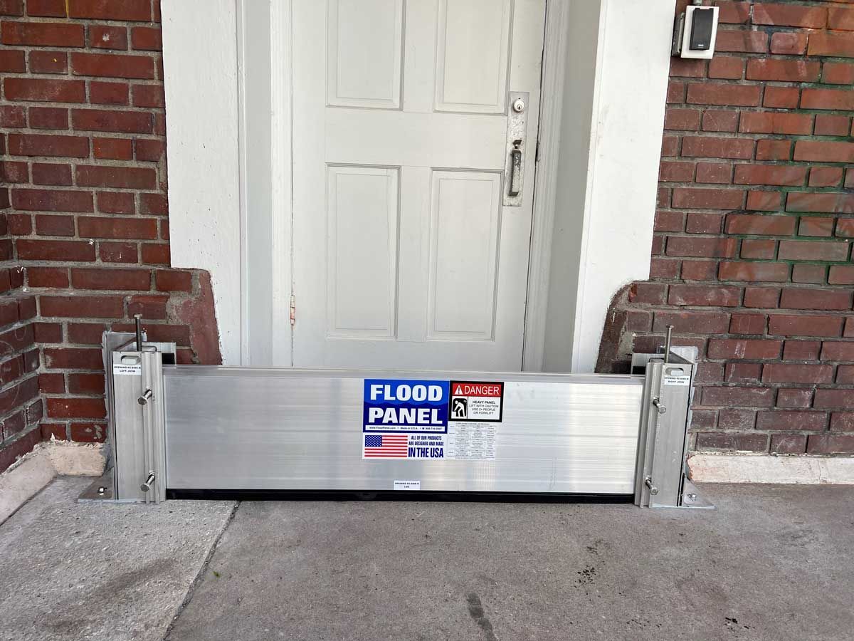 A door with a flood panel in front of it