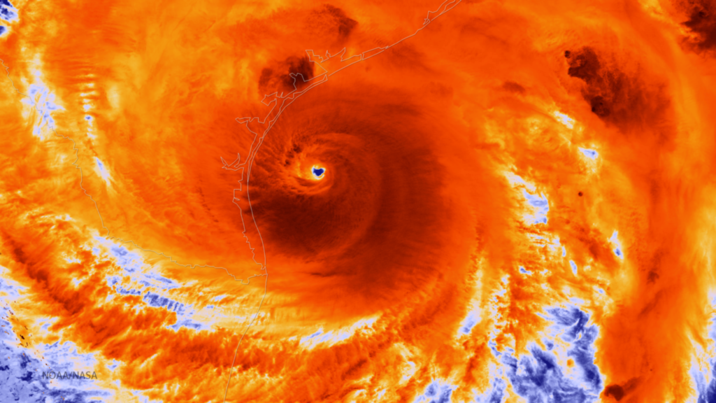 A satellite image of a hurricane moving through the ocean.