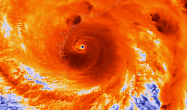 A satellite image of a hurricane moving through the ocean.