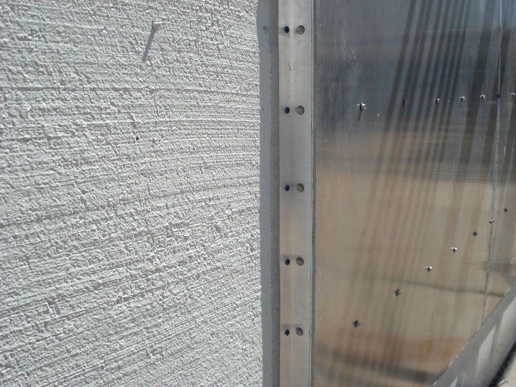 A close up of a metal frame on a wall