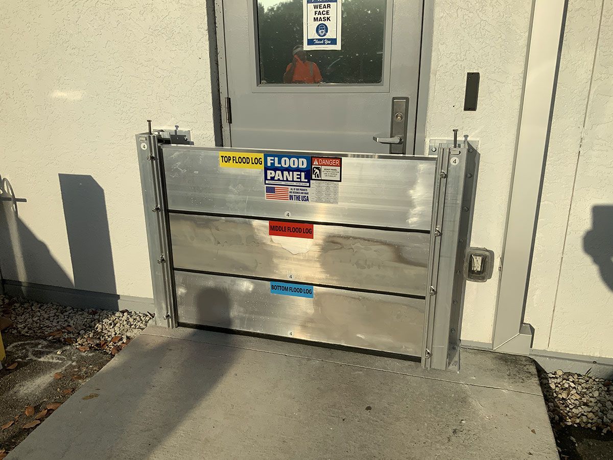 A door with a flood barrier in front of it