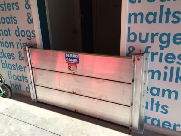 A sign that says ' flood panel ' on it