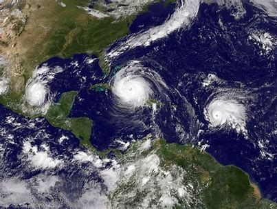 A satellite image of two hurricanes in the ocean