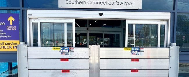 A flood barrier is blocking the entrance to southern connecticut 's airport.