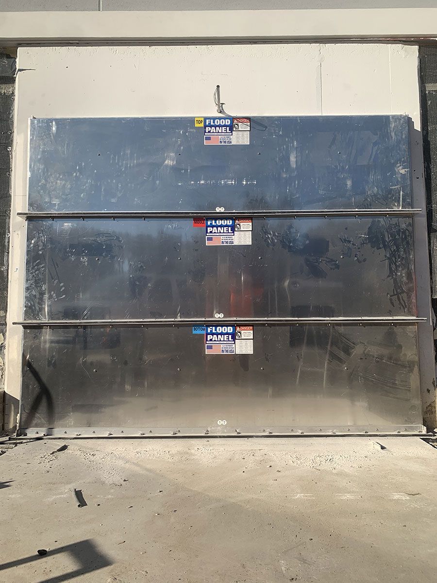 A stainless steel door with a sticker that says ' aluminum ' on it