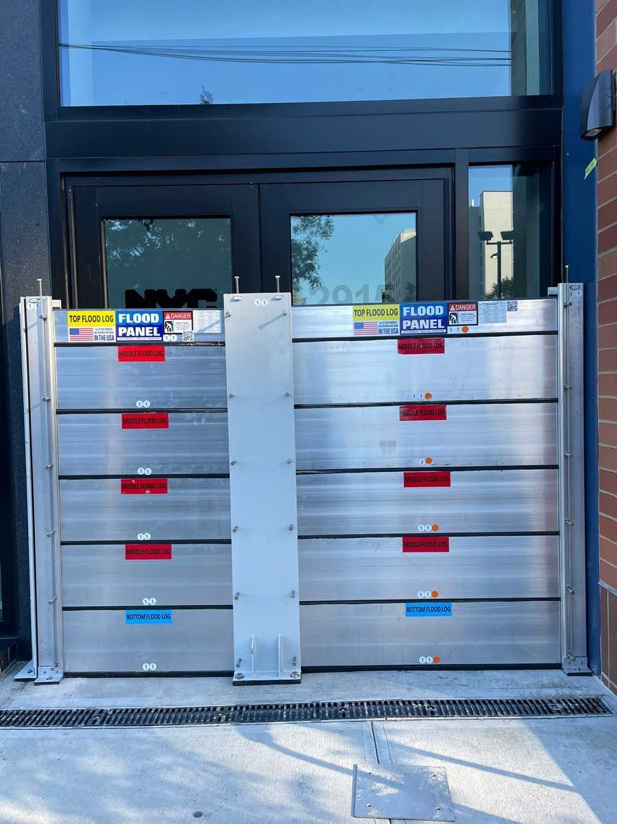 A flood barrier is sitting in front of a building