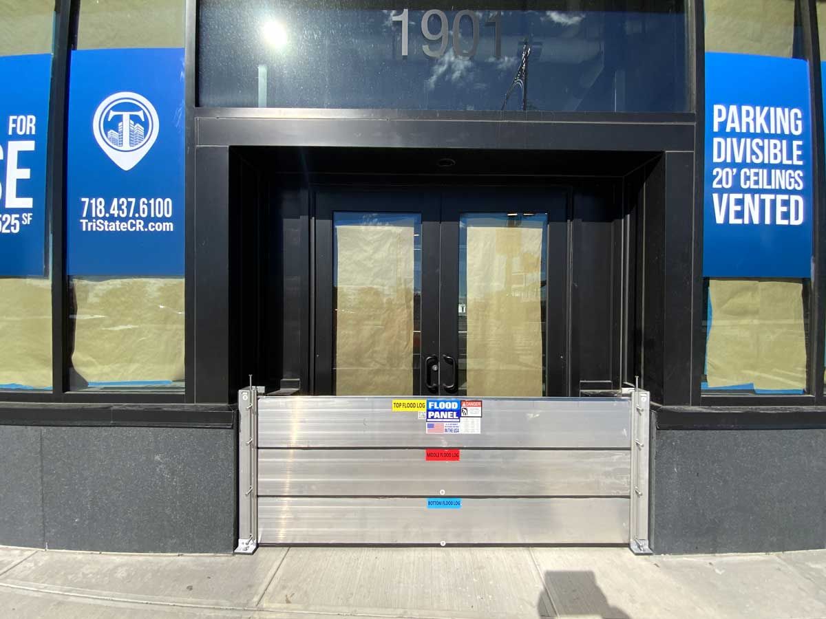 A building with a sign that says parking is visible