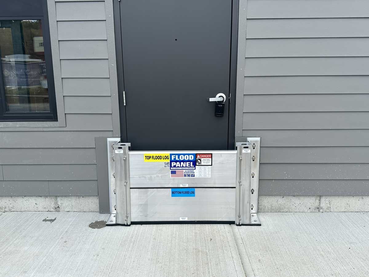 A door with a flood barrier in front of it