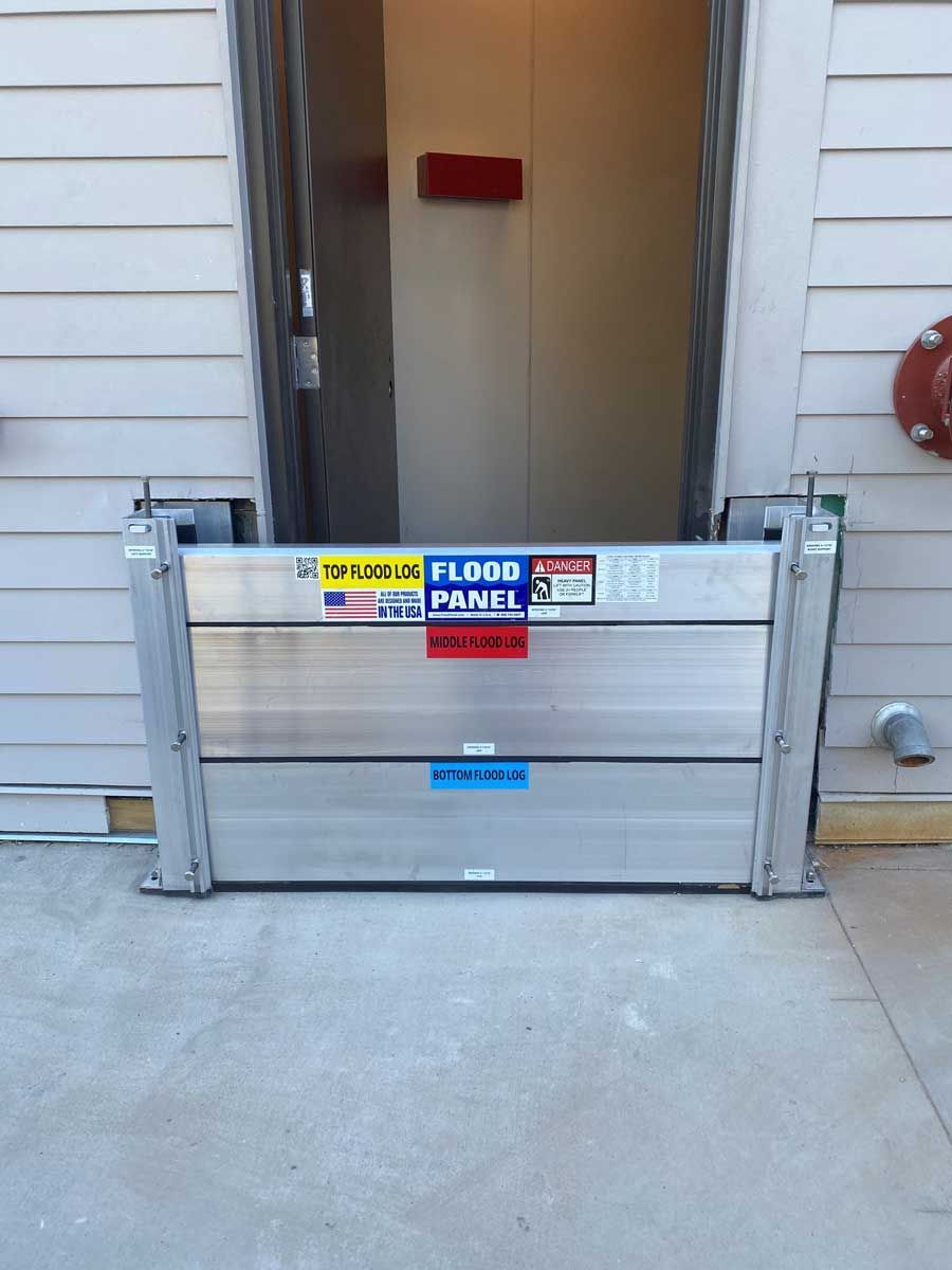 A door with a flood panel in front of it