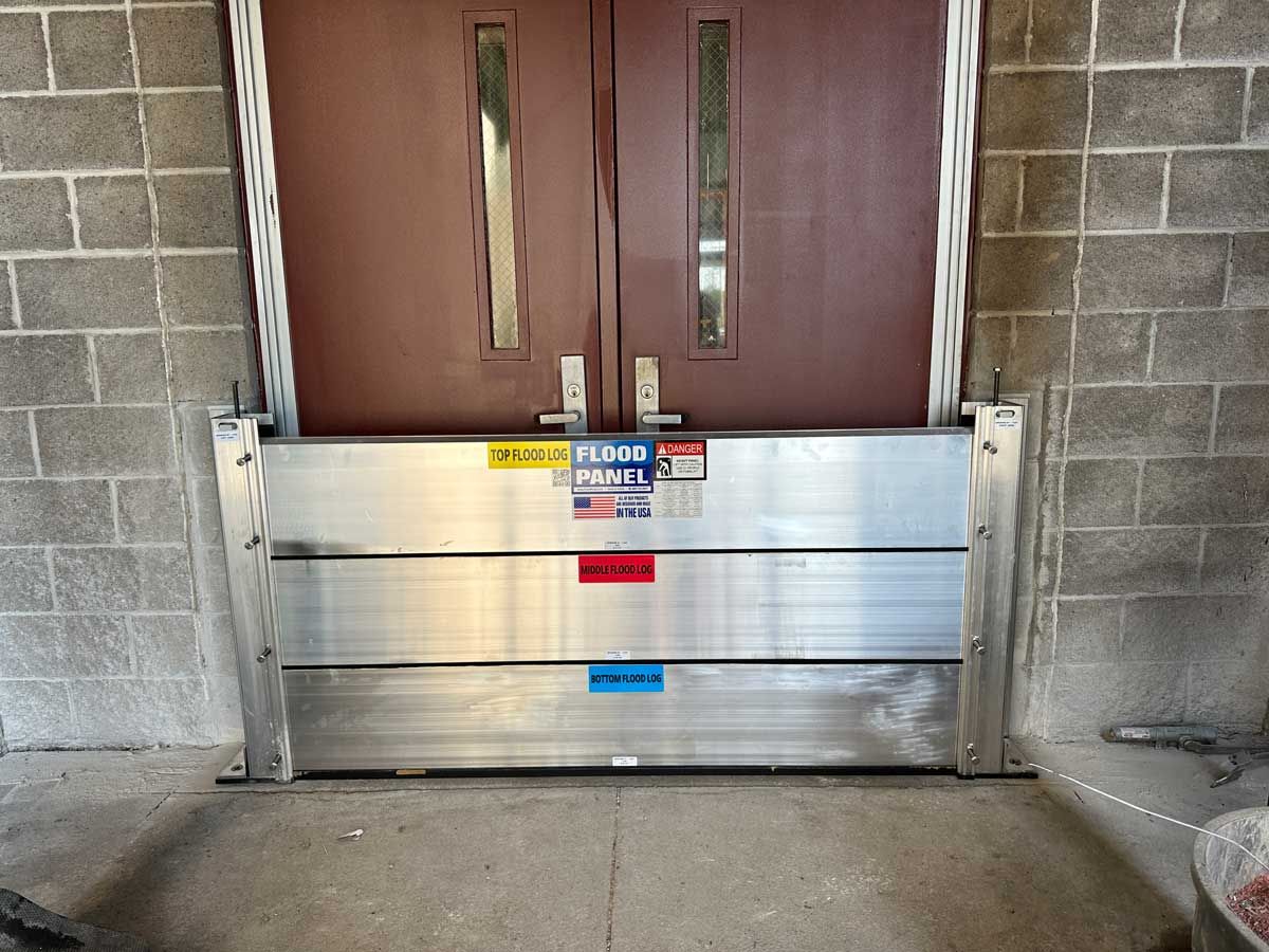 A door with a metal barrier in front of it