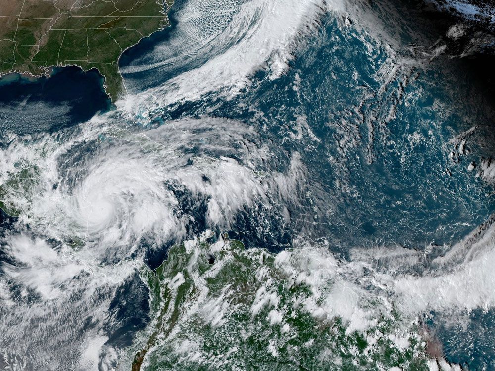 An aerial view of a hurricane in the ocean.