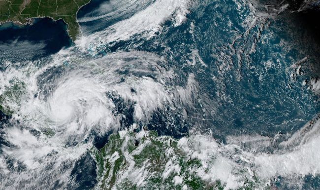 An aerial view of a hurricane in the ocean.