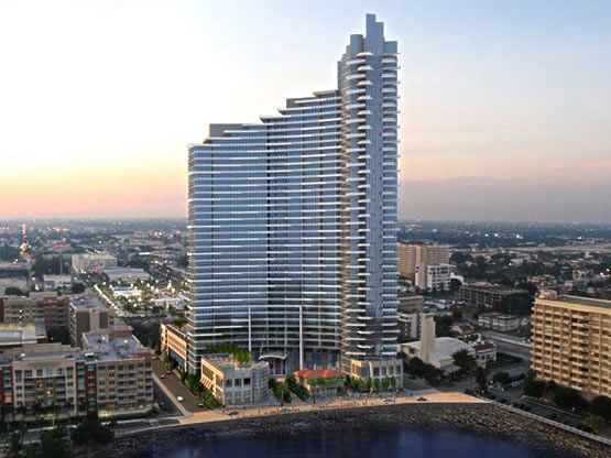 An artist 's impression of a tall building in a city.