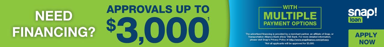 A green and blue sign that says need financing