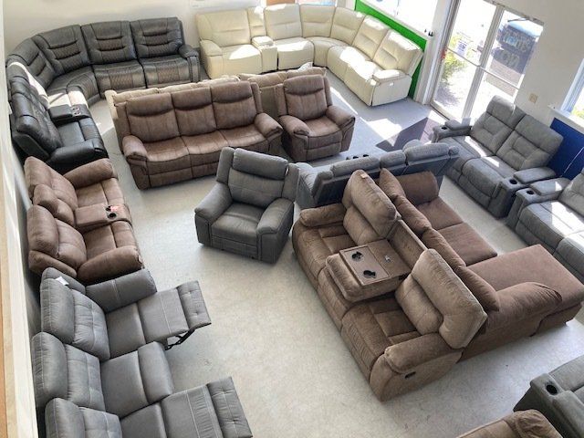 A room filled with lots of couches and chairs
