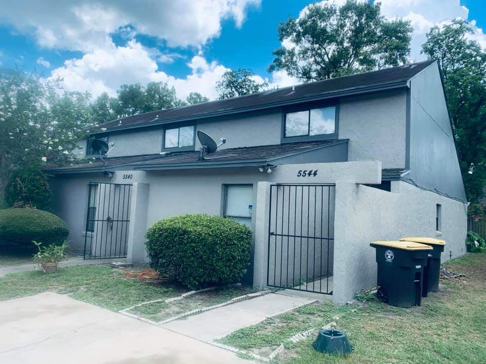 Siding Repair — Modern Row House in Greencove Springs, FL