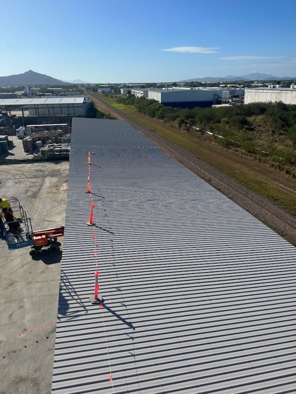 Building Under Renovation with Construction Scaffolding — Commercial Builder in Townsville, QLD