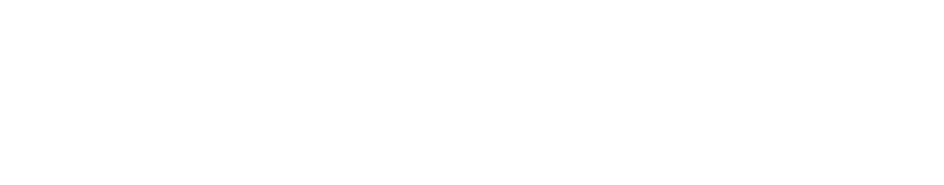 A group of people standing on a stage at a conference, with a projection screen in the background.