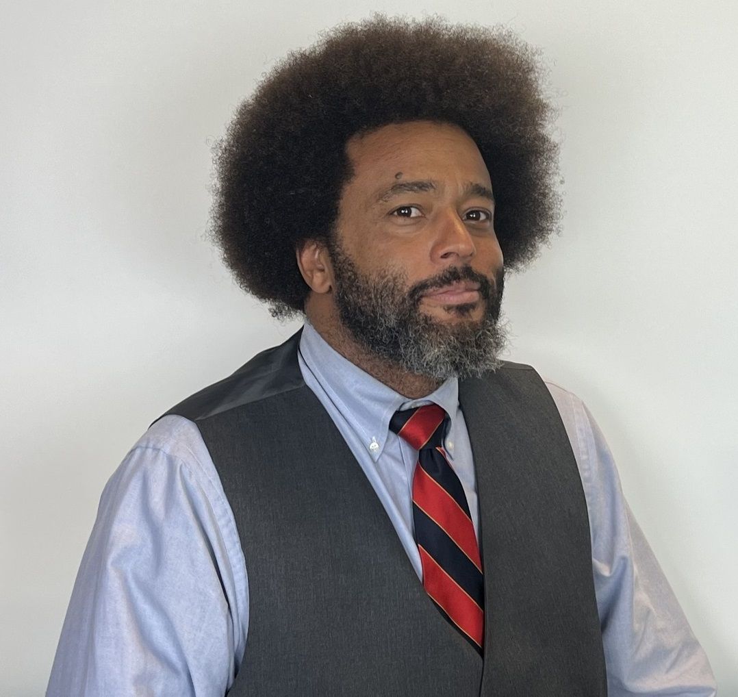 headshot of Uche Nchekwube