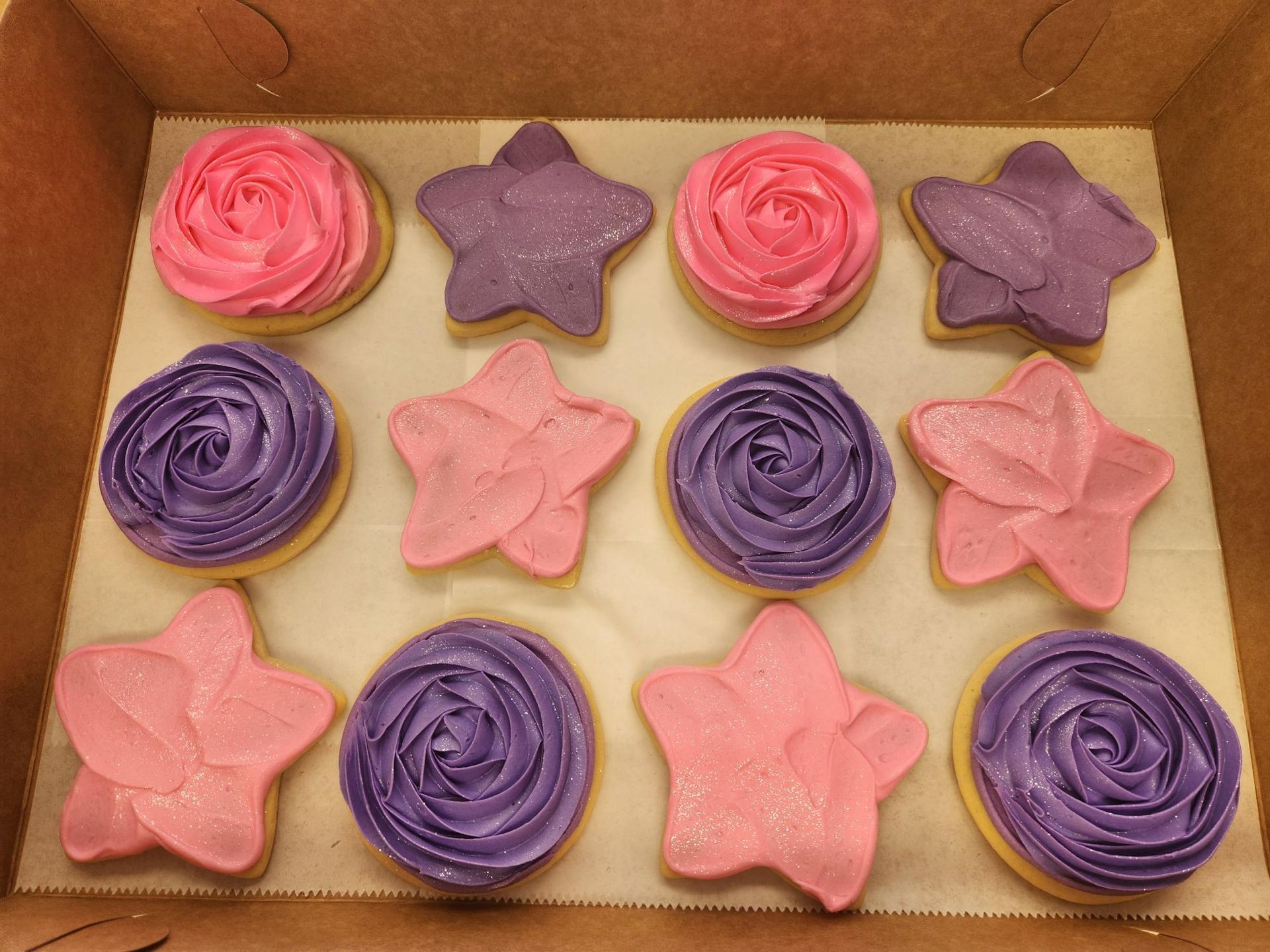 A pile of colorful cookies with smiley faces on them