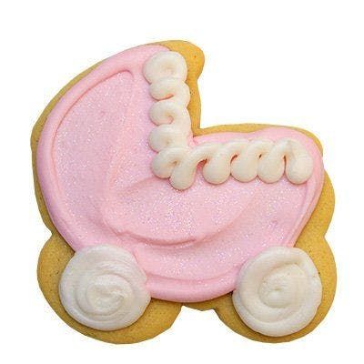 A cookie in the shape of a baby carriage with pink frosting