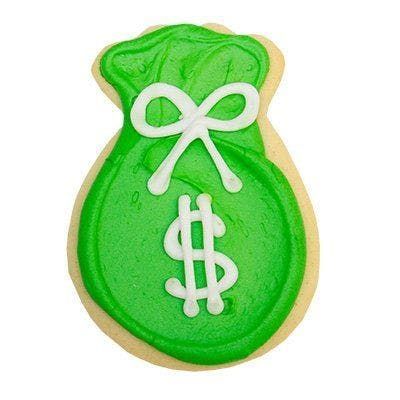 A cookie decorated to look like a bag of money with a dollar sign on it.