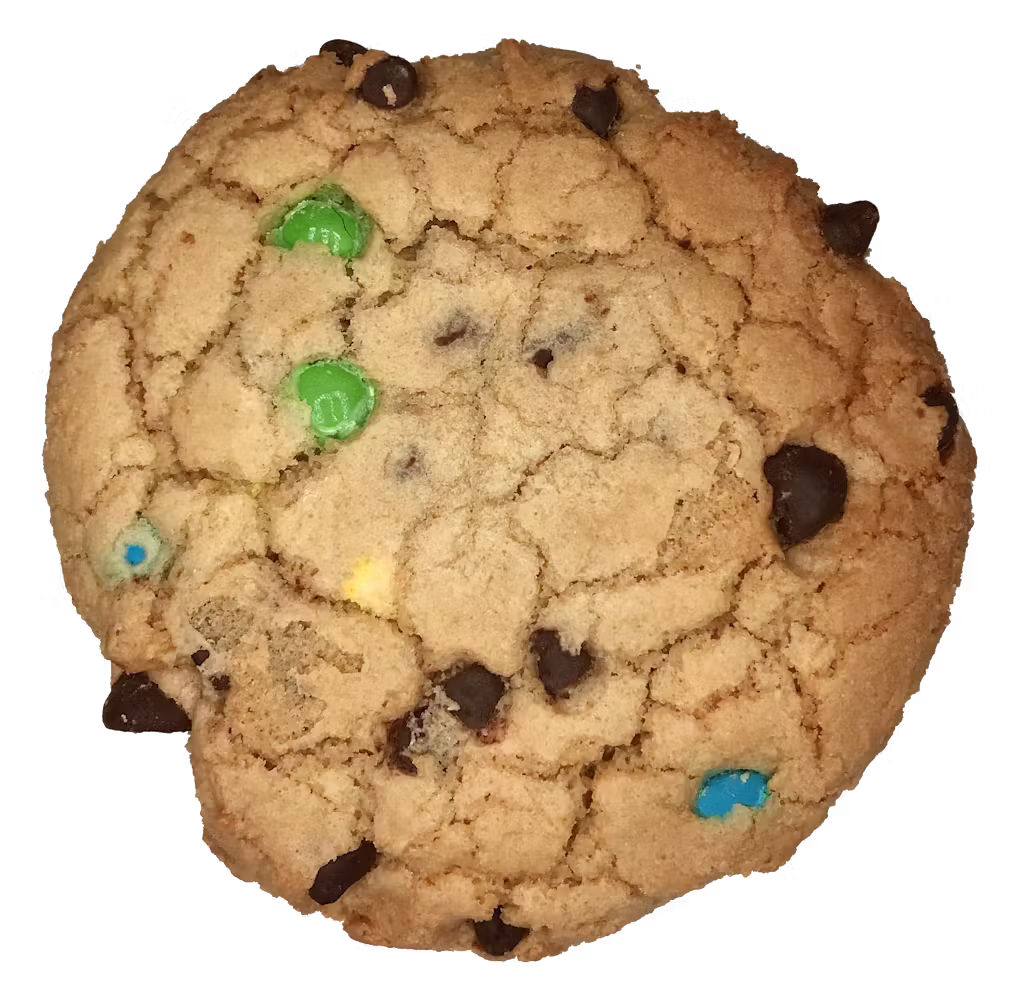 A cookie with chocolate chips and m & m 's on it