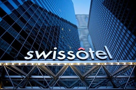 Swissotel is written on the side of a building