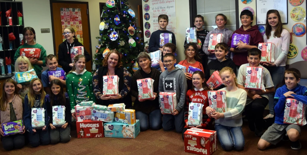 Merino 6th Graders pictured with diaper donation