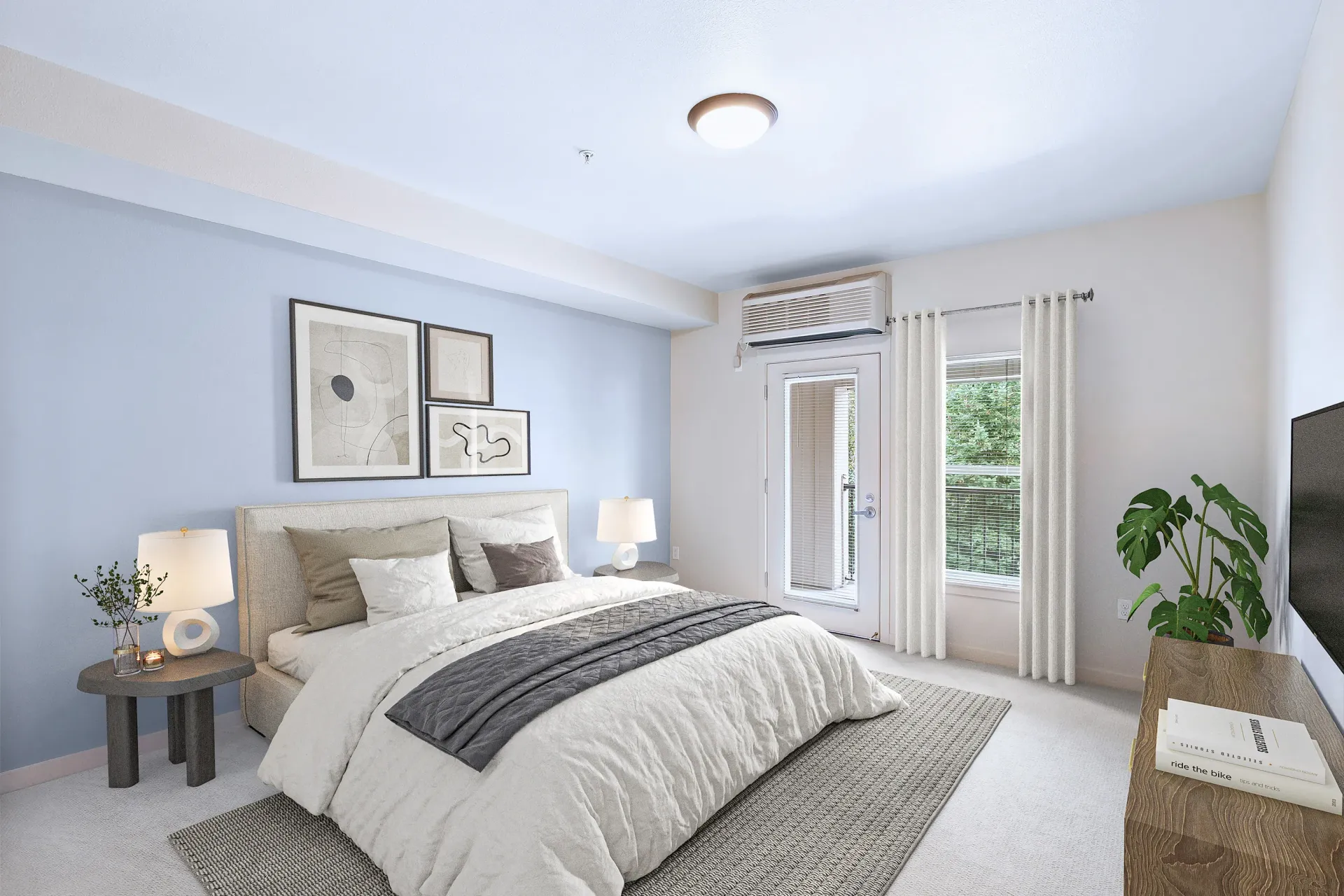 Bedroom with queen bed, blue accent wall, two nightstands, wall art, and a balcony door.