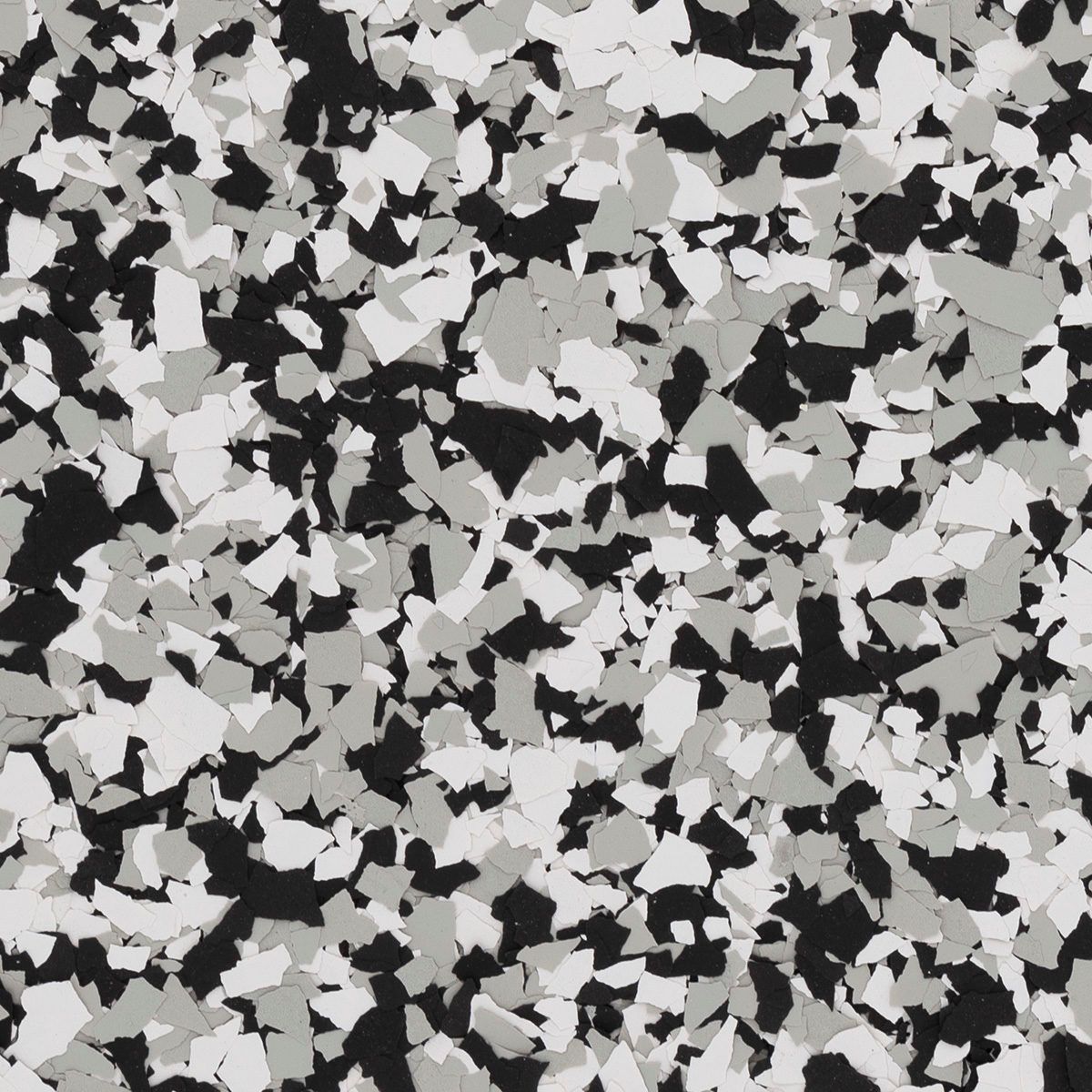 Speckled flooring pattern with black, light gray, and white chips.
