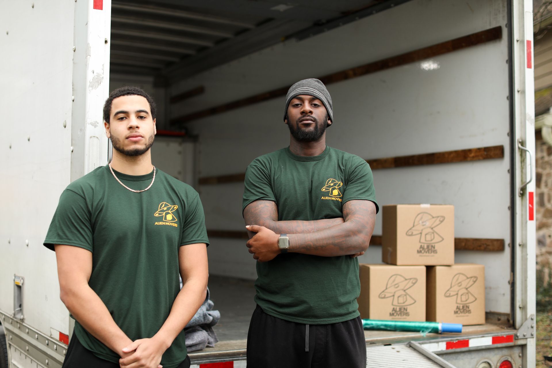 Diligent Alien Movers team members in Philadelphia disassembling office furniture with care and precision, ensuring a smooth and organized corporate relocation process.