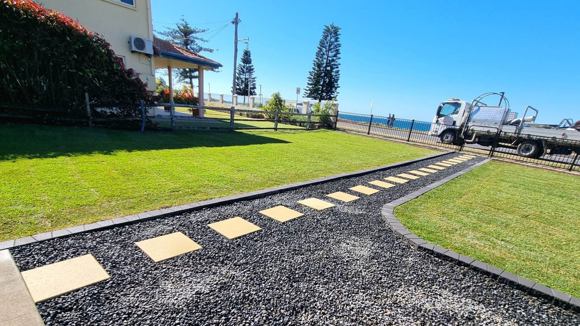 Stone Path With Stepping Stones Leading to a Truck Near the Ocean — On The Mark Landscaping in Branyan, QLD