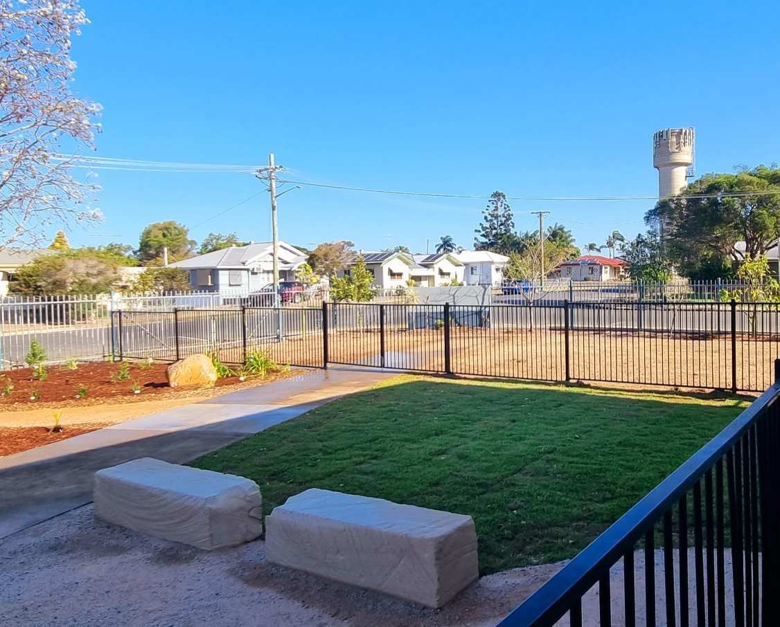 Park With Benches, Lawn, and Fence in a Residential Neighborhood — On The Mark Landscaping in Bargara, QLD