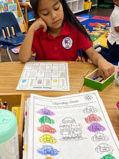 Boys clearing the container