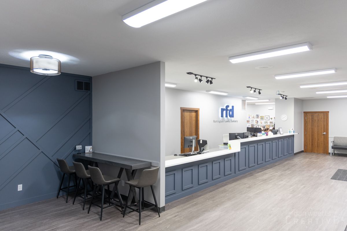 There is a long counter in the middle of the room.