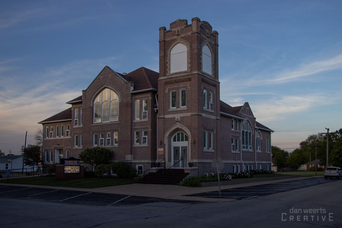 A large brick building with a clock tower on top of it