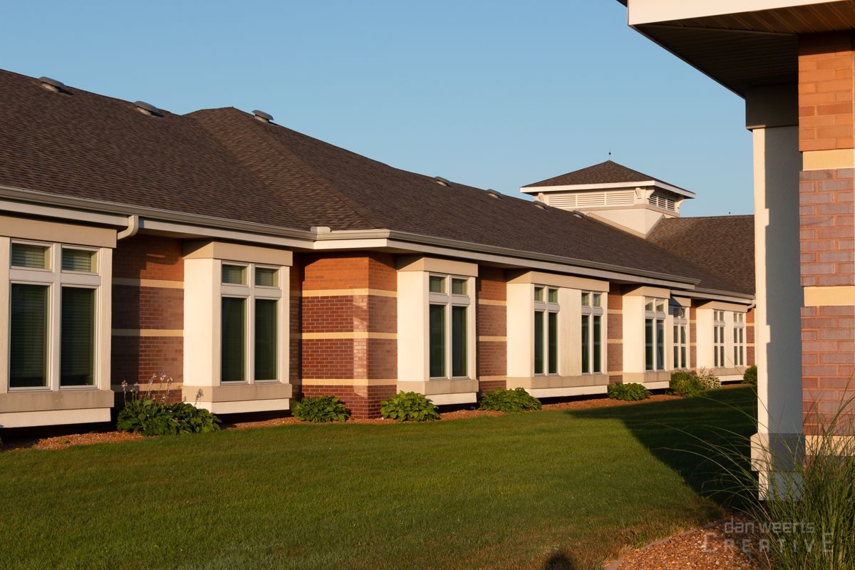 A large brick building with a lot of windows