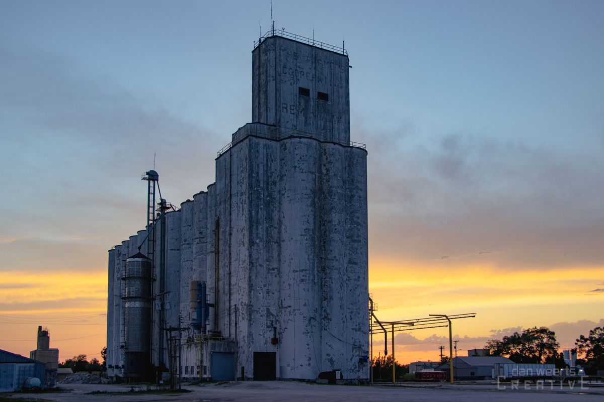 Remington grain elevator with a sunset in the background.
