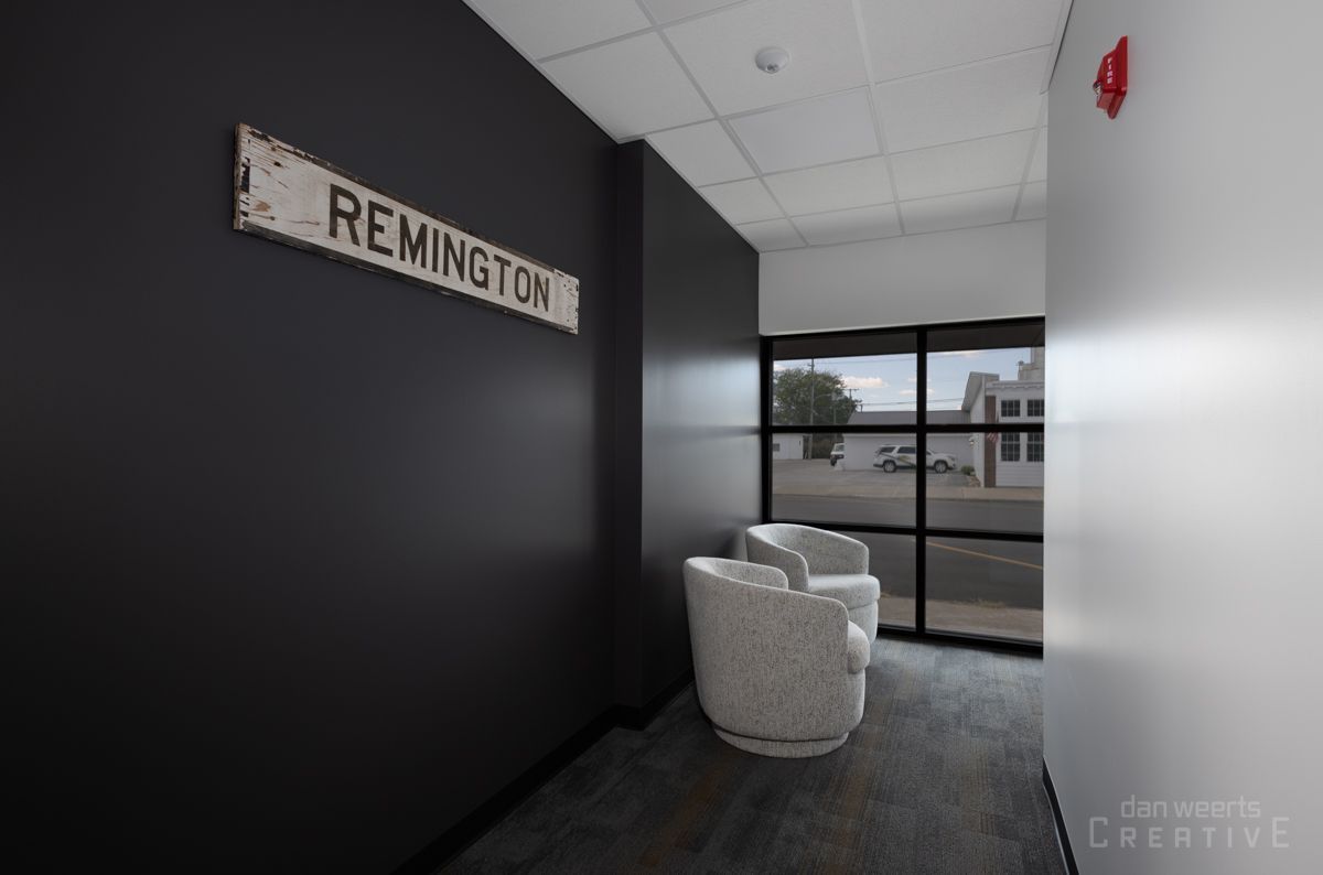 A room with a sign on the wall that says remington