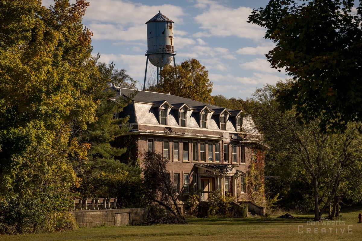 An old building with a water tower on top of it