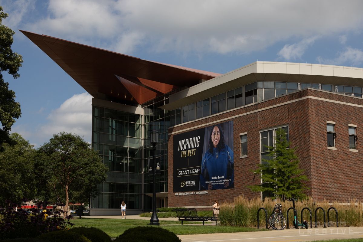 A large building with a large billboard on the side of it
