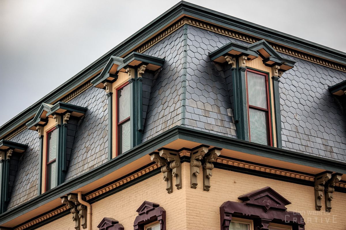 A building with a roof that has a lot of windows on it